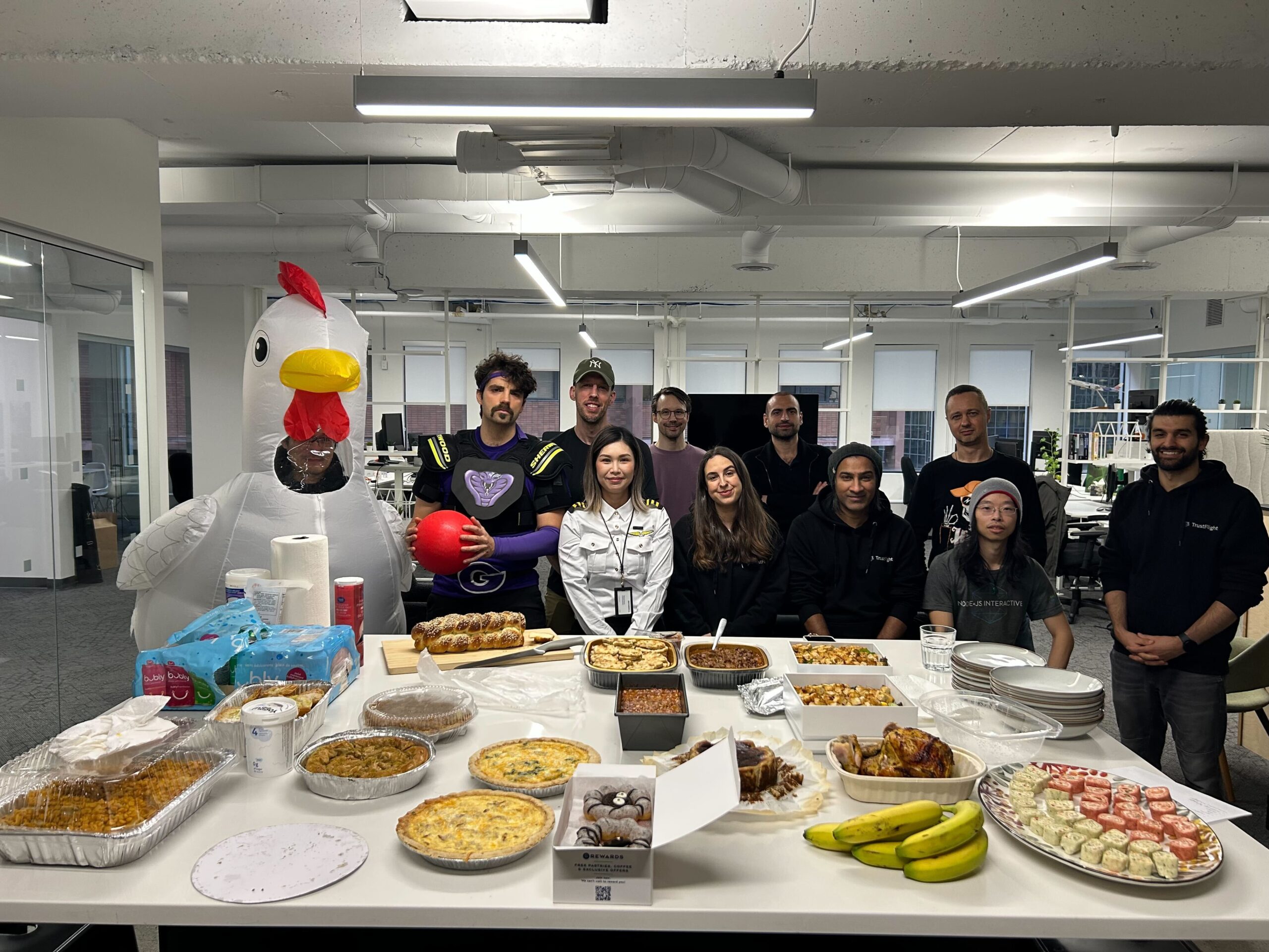 TrustFlight employees at a potluck
